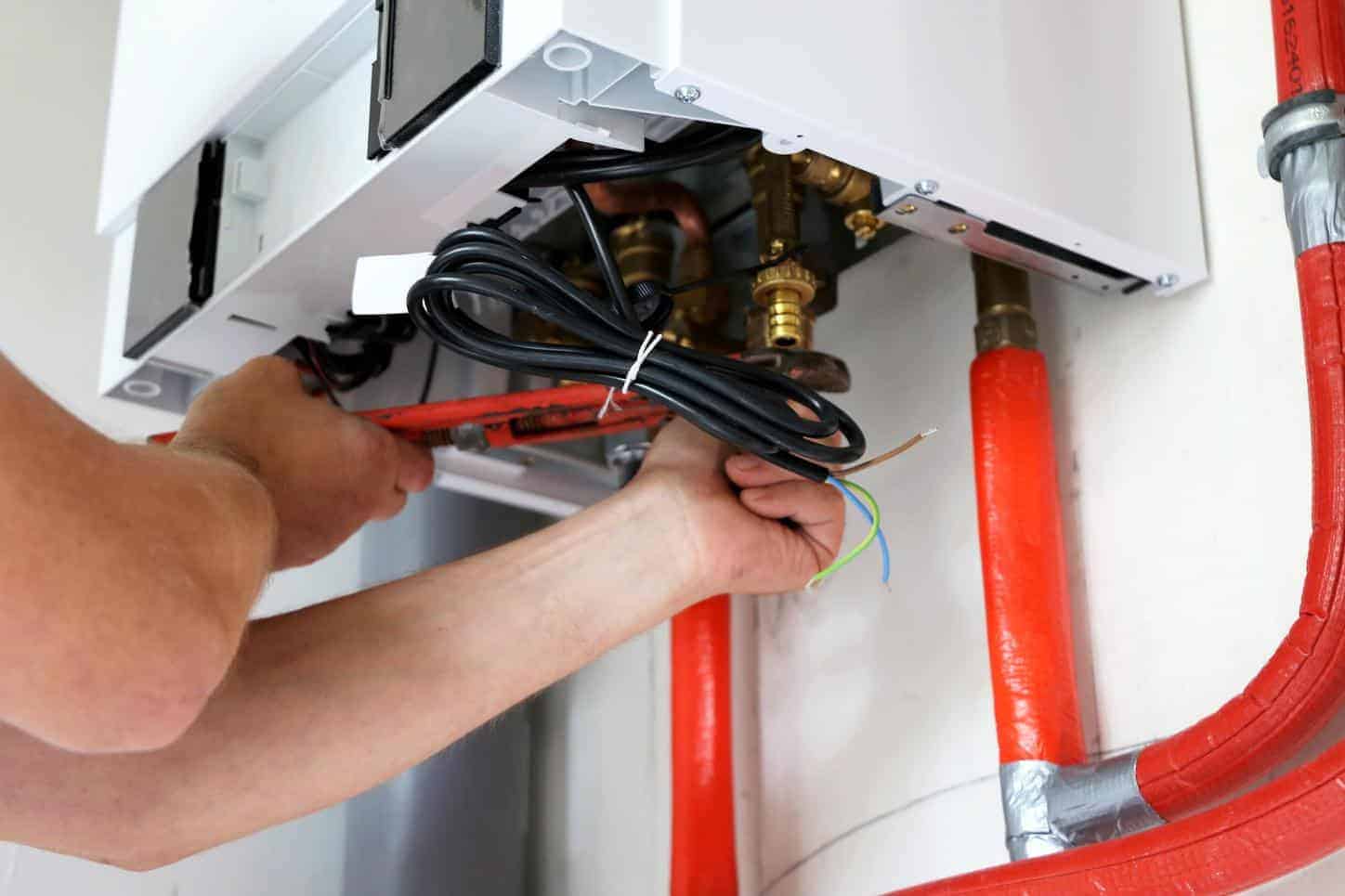 boiler engineer fixing a boiler in croydon