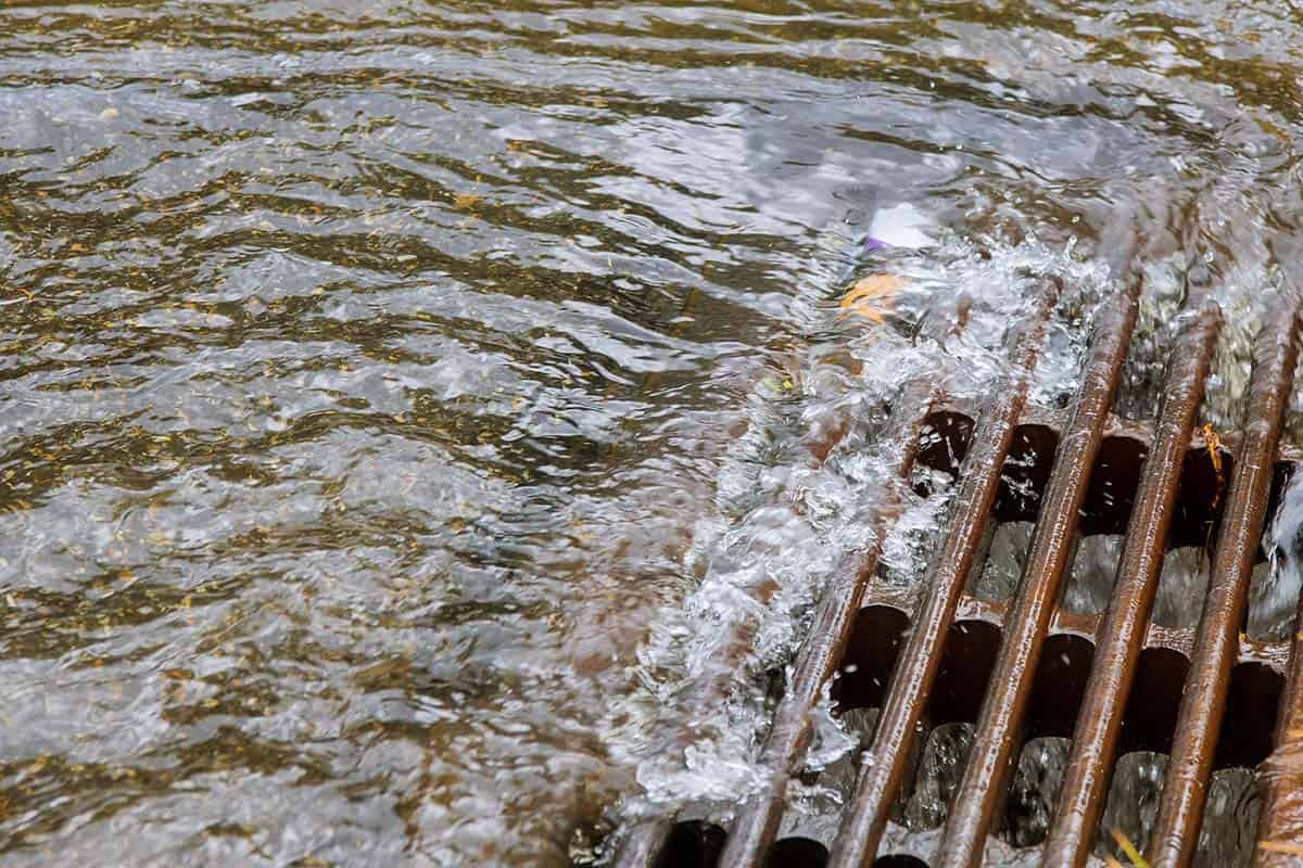 waters flooding down blocked drain